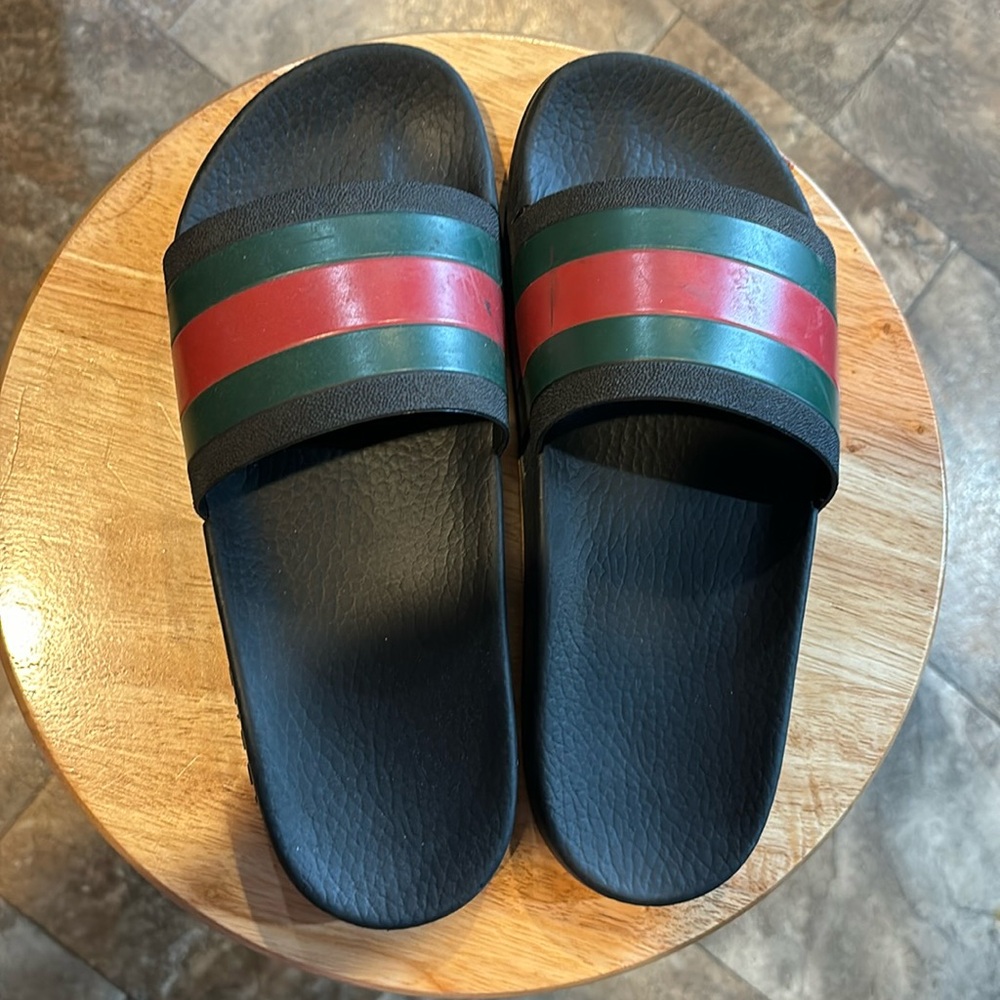 used women’s  size 7  gucci slides